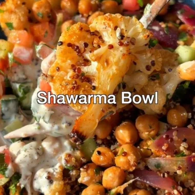Delicious cauliflower shawarma bowl served in a vibrant dish with fresh vegetables.