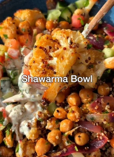 Delicious cauliflower shawarma bowl served in a vibrant dish with fresh vegetables.