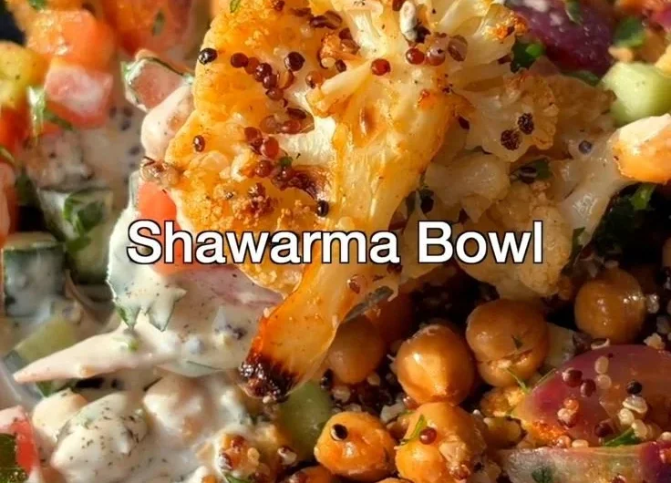 Delicious cauliflower shawarma bowl served in a vibrant dish with fresh vegetables.