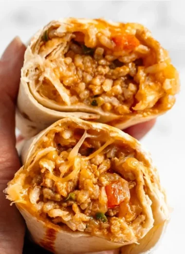 Delicious cheesy chicken burritos ready to be served.