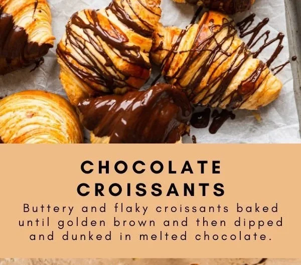 Freshly baked chocolate croissants with rich cocoa filling and flaky pastry