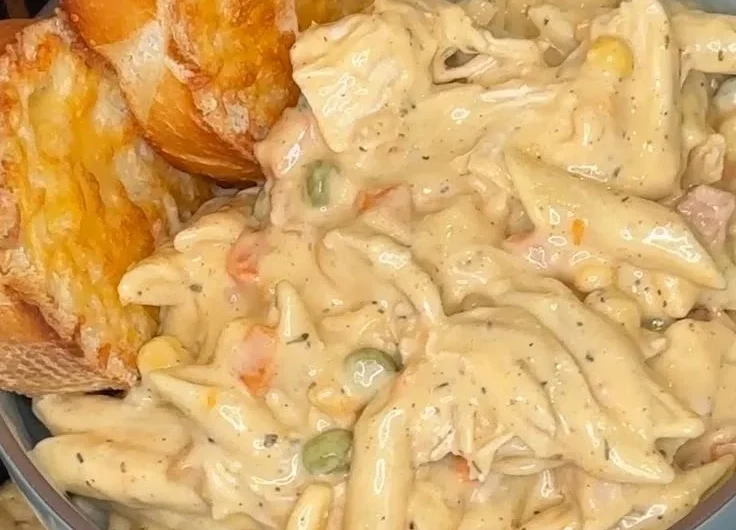 Crock Pot Chicken Pot Pie Pasta with vegetables and creamy sauce