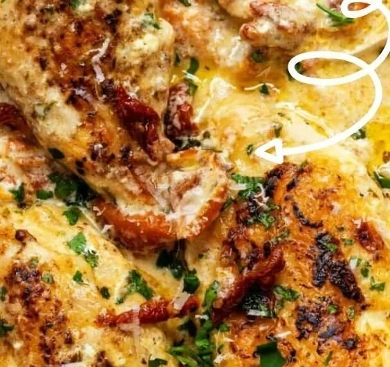Crock Pot Marry Me Chicken dish served with creamy sauce and herbs