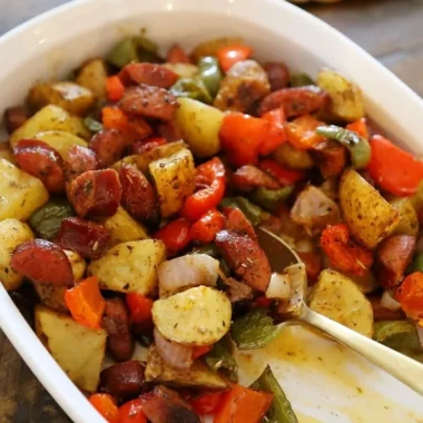 One-Pan Roasted Sausage with Peppers and Potatoes presented on a plate