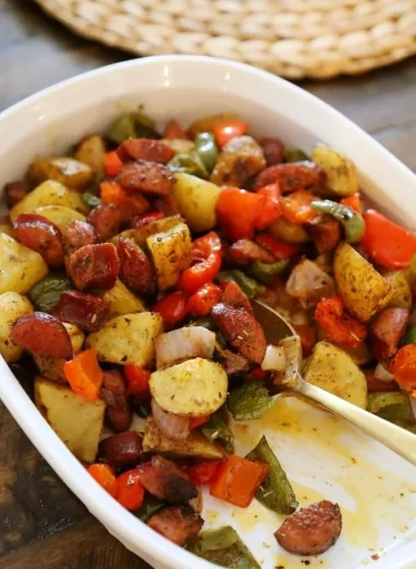 One-Pan Roasted Sausage with Peppers and Potatoes presented on a plate