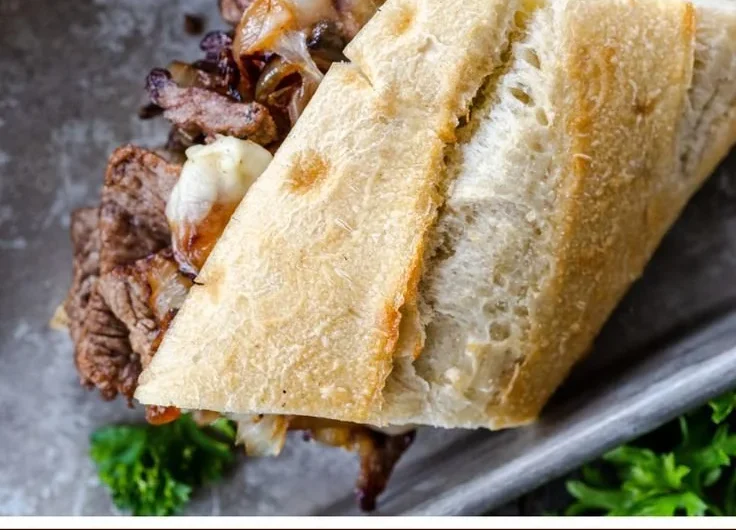 Delicious steak sandwiches with fresh ingredients and juicy beef