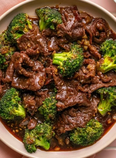 Delicious Beef and Broccoli stir-fry served in a bowl with chopsticks