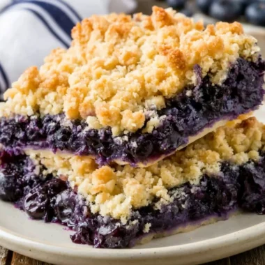 Delicious homemade blueberry crisp topped with crunchy oats and sugar