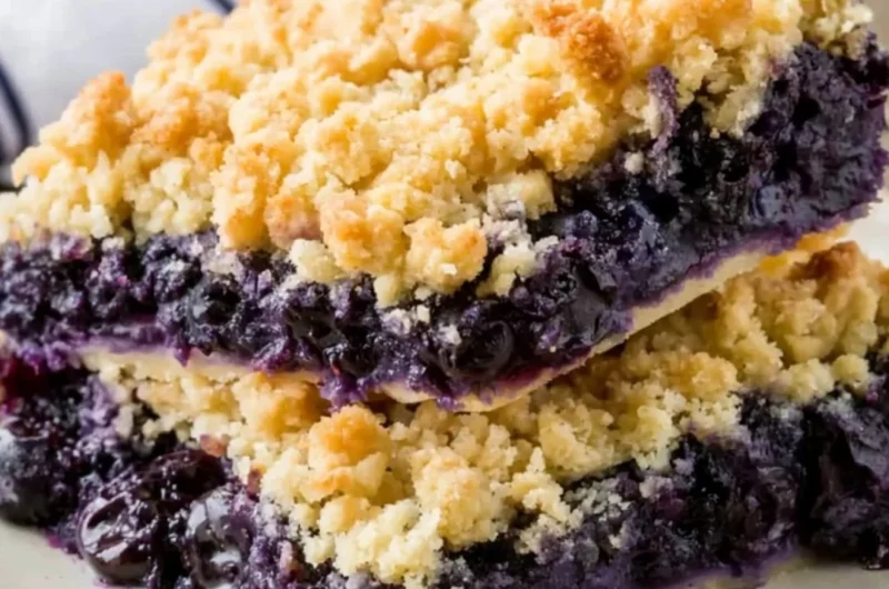 Delicious homemade blueberry crisp topped with crunchy oats and sugar