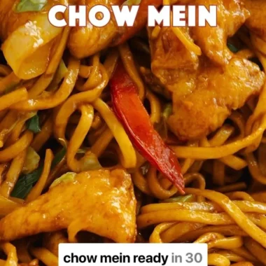 Plate of Chicken Chow Mein with vegetables and chicken stir-fried noodles