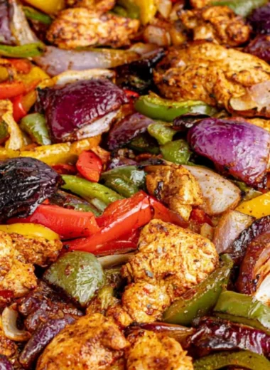 Sheet pan chicken fajitas with colorful bell peppers and spices ready to serve