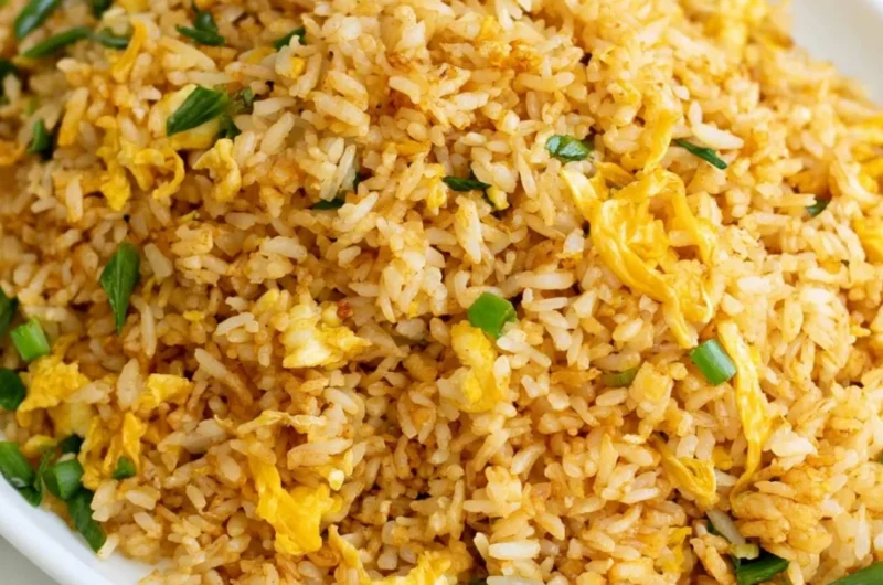 A bowl of quick and easy 10-minute fried rice with colorful vegetables.