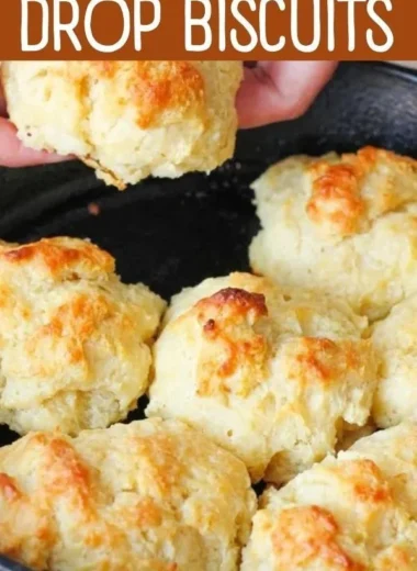 Freshly baked easy drop biscuits on a cooling rack.