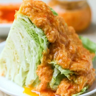 Japanese carrot ginger dressing in a glass jar with fresh ingredients