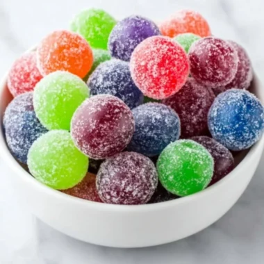Colorful Kool-Aid Grapes arranged on a plate, ready to be enjoyed.