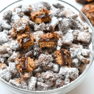 A bowl of Samoas Puppy Chow, a delicious and sweet snack mix.