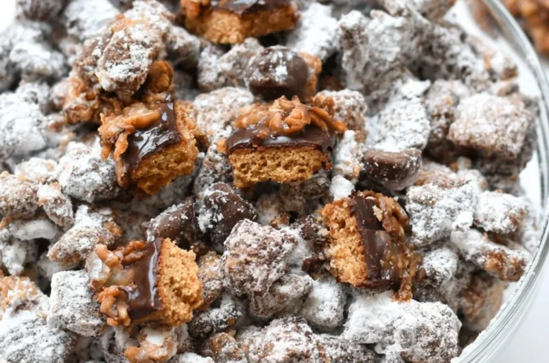 A bowl of Samoas Puppy Chow, a delicious and sweet snack mix.