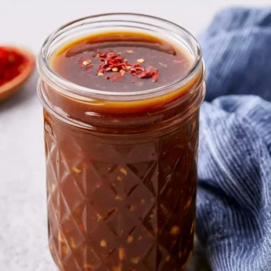 A bowl of homemade stir fry sauce suitable for various healthy recipes.