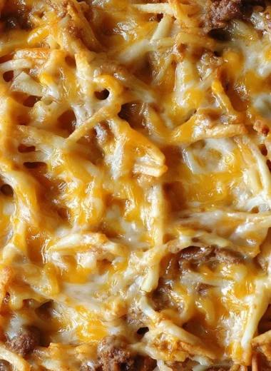 Delicious Taco Hashbrown Casserole cooked in a slow cooker