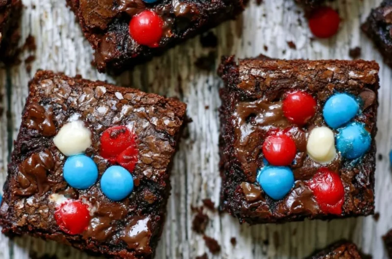 Delicious ultimate easy brownies on a plate with chocolate drizzle