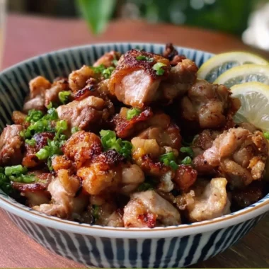 Yakitori-inspired salt and pepper chicken bites on a serving plate
