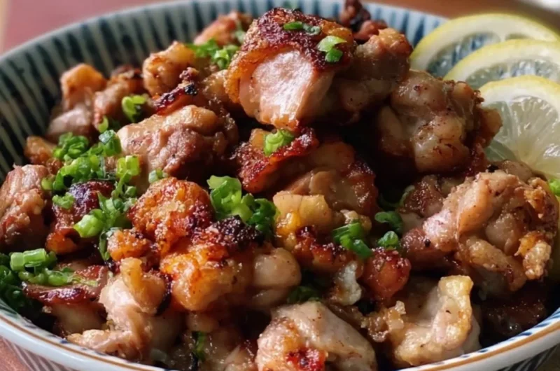 Yakitori-inspired salt and pepper chicken bites on a serving plate