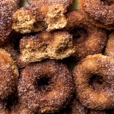 Delicious baked apple cider donuts with a sprinkle of cinnamon sugar