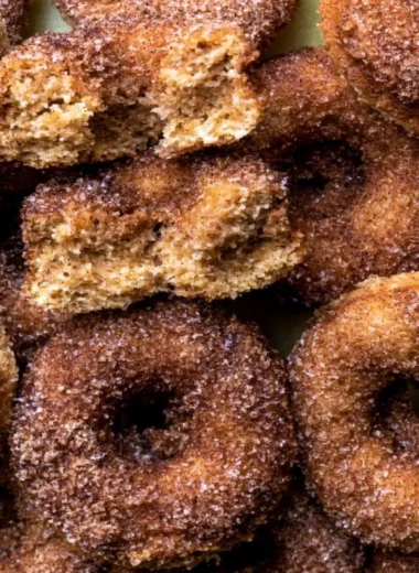 Delicious baked apple cider donuts with a sprinkle of cinnamon sugar