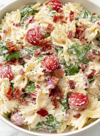 Colorful BLT Pasta Salad with bacon, lettuce, and tomatoes in a bowl