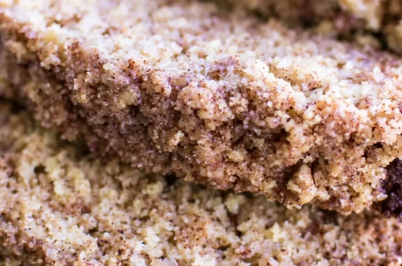 Delicious Coffee Cake Banana Bread topped with nuts and spices