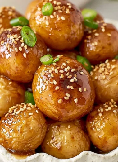 Cozy Korean braised potatoes served in a bowl with seasonings