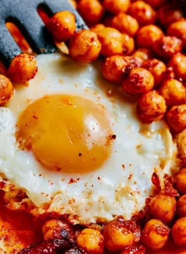 Cozy chickpea fried eggs served on a plate for a warm dinner.
