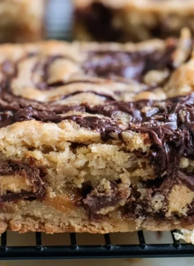 Delicious Moose Tracks Cookie Bars with chocolate and peanut butter toppings