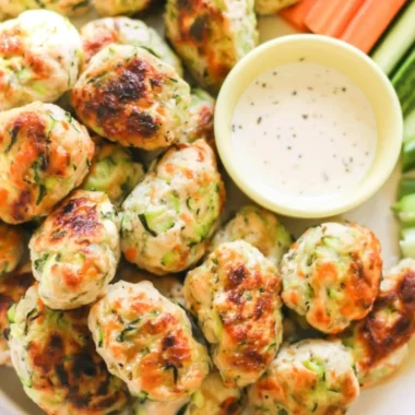 Plate of kid-friendly veggie chicken nuggets with vegetables side